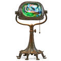 Tiffany studios fine early desk lamp with turtleback shade and adjustable base new york 1900s patinated bronze favrile glass single socket base stamped tiffany studios new york 470a 16 x 9