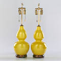 Designer pair of double gourd lamps late 20th c glazed porcelain walnut and brass fittings unmarked 27 12 x 8 dia