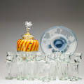 Contemporary glassware eighteen pieces set of eight lovers goblets by james wayne set of eight parfait glasses by l livolsi day and night plate by mike joplin and elephant jar by james nad