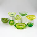 Vaseline glass six pieces together with two murano dishes with encased goldleaf decoration hand blown glass none marked largest 2 x 5 34 x 7