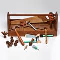 Michael graves tj kick set of postmodern tools including hammer saw chisel and screwdrivers by graves together with novelty wooden tools in wooden toolbox by kick usa 1980s unmarked toolb