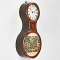 Figure eight mahogany wall clock