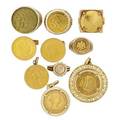Collection of gold coin jewelry and a charm