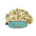 Black opal and jeweled 18k gold platinum brooch