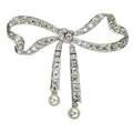 Tb starr diamond pearl and platinum bow brooch