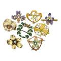 Eight art nouveau gold flower brooches
