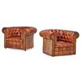 Pair of tufted leather club chairs