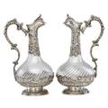 Pair of french silver mounted claret jugs