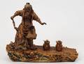 POTTERY FIGURE OF A FISHERMAN
