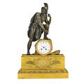 Empire gilt and patinated bronze mantel clock