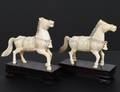 PAIR OF CARVED IVORY HORSES
