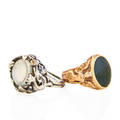 Two figural gold or silver and gemstone rings