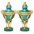 Pair of gilt bronze and malachite urns