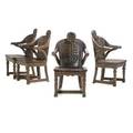 Four figural fantasy oak armchairs