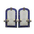 Pair of renaissance style patinated metal mirrors
