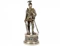 STERLING SILVER AND CARVED IVORY FIGURE OF A KNIGHT