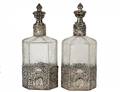 PAIR OF CONTINENTAL SILVER MOUNTED GLASS DECANTERS