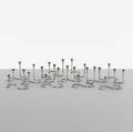 Eigil Jensen   collection of twelve candlesticks