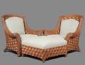 PAIR OF WICKER ARM CHAIRS AND AN OTTOMAN