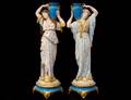 GOOD PAIR OF BISQUE AND PORCELAIN FEMALE WATER CARRIERS