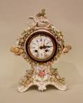 Floral  Putti Decorated Mantle Clock