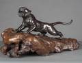 PATINATED BRONZE FIGURE OF A TIGER