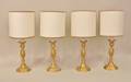 Group of Four Gilt Metal Table Lamps