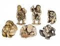 GROUP OF SIX CARVED IVORY NETSUKES