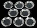SET OF EIGHT STERLING SILVER MOUNTED GLASS COASTERS