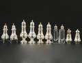 FIVE PAIRS OF STERLING SILVER AND GLASS SHAKERS