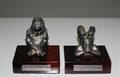 321 TWO TANE 925 SILVER SMALL SCULPTURES OF AZTEC FIG