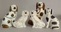 275 PAIR OF STAFFORDSHIRE POTTERY FIGURES OF DOGSEngl