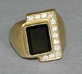 335 18KT YELLOW GOLD BLACK SAPPHIRE AND DIAMOND RING