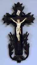 34 CONTINENTAL CARVED IVORY AND WOOD CRUCIFIX