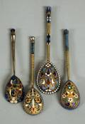41 FOUR RUSSIAN SILVER GILTENAMEL TEA SPOONS