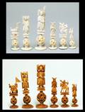 25 CARVED IVORY PUZZLEBALL FIGURAL CHESS SET
