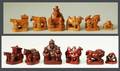 58 MONGOLIAN CARVED WOOD FIGURAL SET