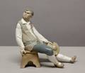 1012 Lladro porcelain figure of a seated peasant