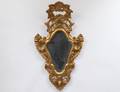 ROCOCO STYLE CARVED AND GILTWOOD MIRROR