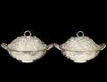 PAIR OF STERLING SILVER REPOUSSE SUPPER DISHES AND