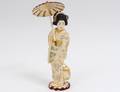 CARVED AND POLYCHROMED IVORY FIGURE OF A GEISHA