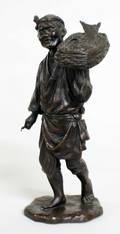 1112 PATINATED BRONZE FIGURE OF A FISH SELLER