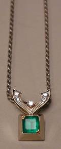 1097 14K WHITE GOLD EMERALD AND DIAMOND DROP