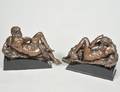 PAIR OF PATINATED BRONZE FIGURES