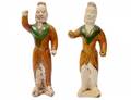 PAIR OF TANG SANCAIGLAZED POTTERY GROOMS