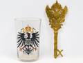 PRUSSIAN ENAMELED GLASS BEAKER AND RUSSIAN BRASS KEY