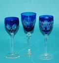 257 GROUP OF THREE BLUE OVERLAY GLASS GOBLETS