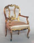 234 LOUIS XVI STYLE CARVED AND GILTWOOD FAUTEUIL