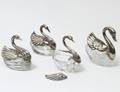GROUP OF FOUR GLASS SWAN OPEN SALTS