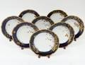 SET OF EIGHT LIMOGES PORCELAIN SOUP PLATES